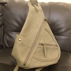 Antka Kraft purse coverts to backpack, sling, or over the shoulder purse.